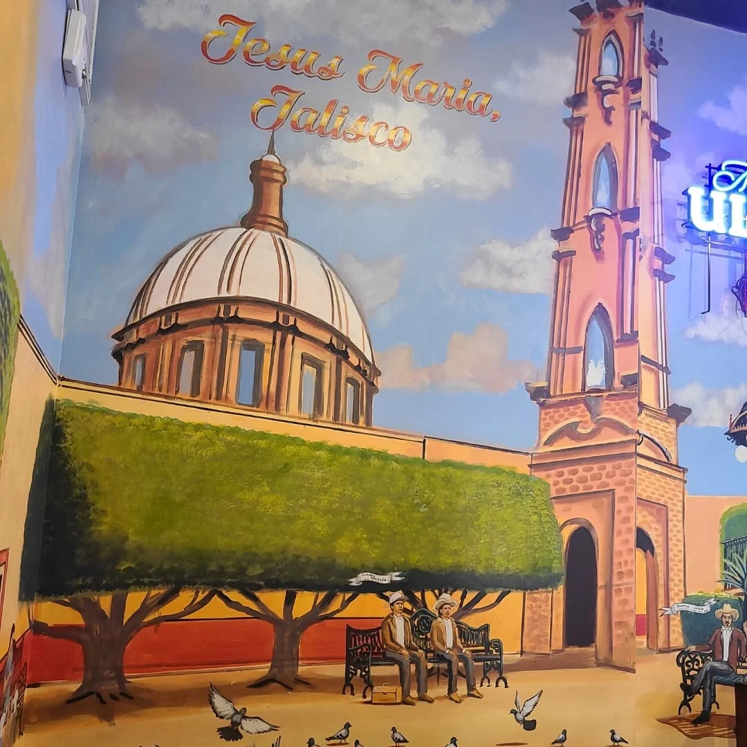 Colorful hand-painted mural inside Hacienda Tapatio